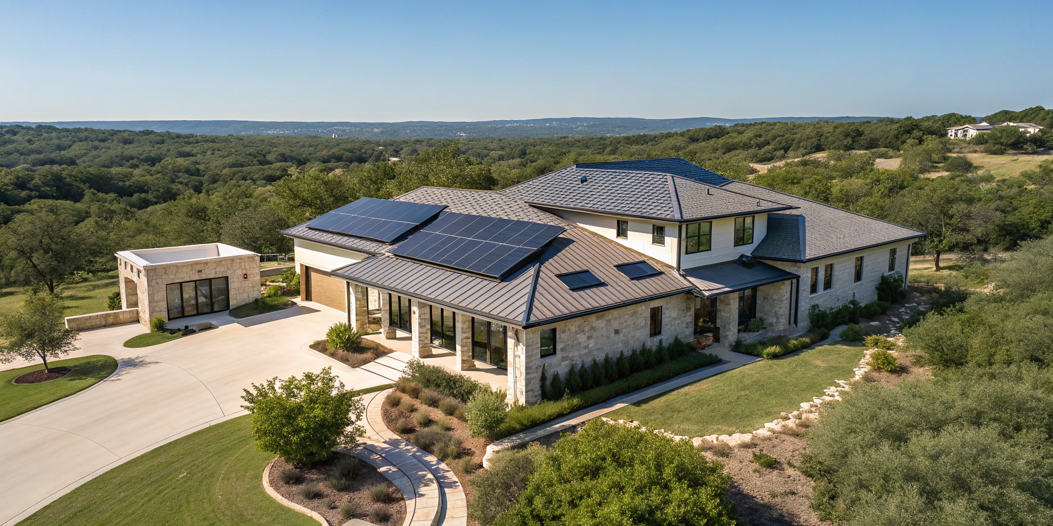 An aerial view of a modern Texas home with solar panels gleaming under the bright sun, surrounded by lush greenery and a clear blue sky, showcasing the seamless integration of solar energy into everyday living.